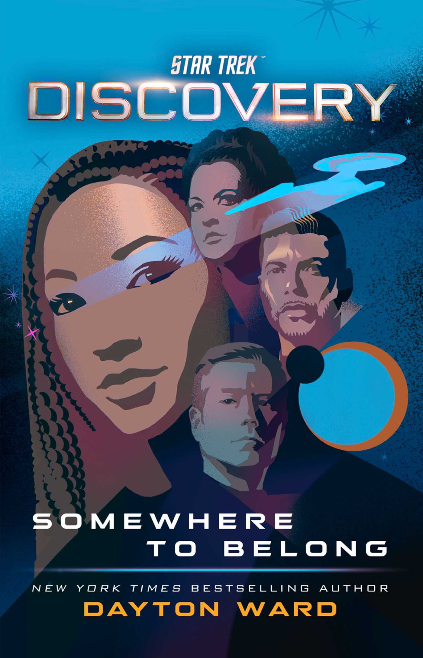 A book cover featuring the title 'Star Trek Discovery: Somewhere to Belong.' The cover showcases a cosmic backdrop with the iconic Starfleet insignia, a vibrant blend of blue and purple hues, and the silhouette of a starship soaring through the stars. There are 4 people on the cover. The largest is the face of a young Black woman with long braids. The other 3 are in a semicircle around her and depict a young white woman with curly hair, a young Hispanic man with goatee and short hair, and a cleanshaven white man with blonde hair.